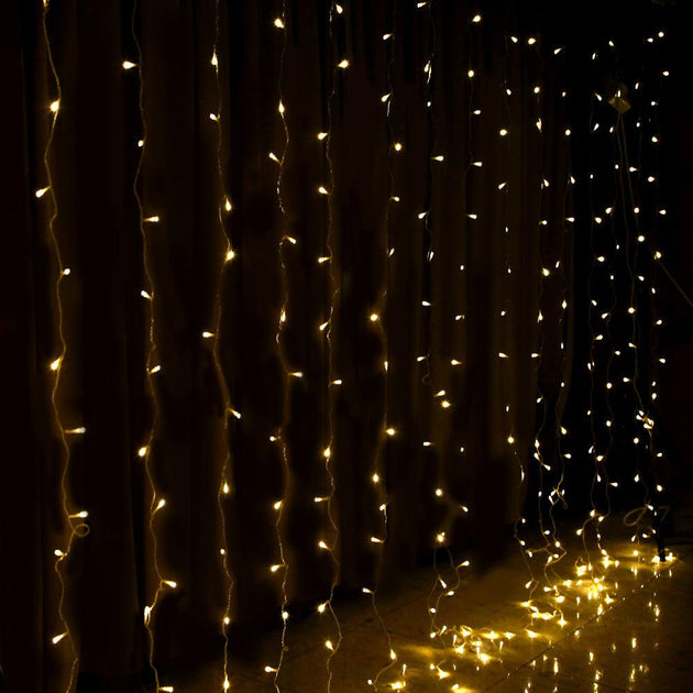 Buy Jingle Jollys 6X3M Christmas Lights Curtain Light Warm White 600 LED discounted | Products On Sale Australia